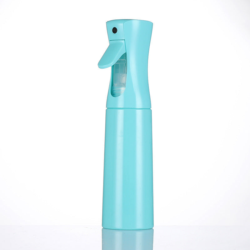 Best continuous spray bottle in blue green color 