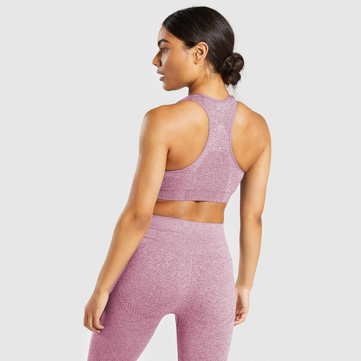 Pink active wear set with crop top and leggings