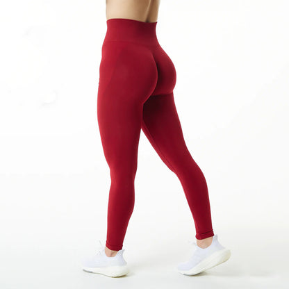 Back side of red leggings for yoga