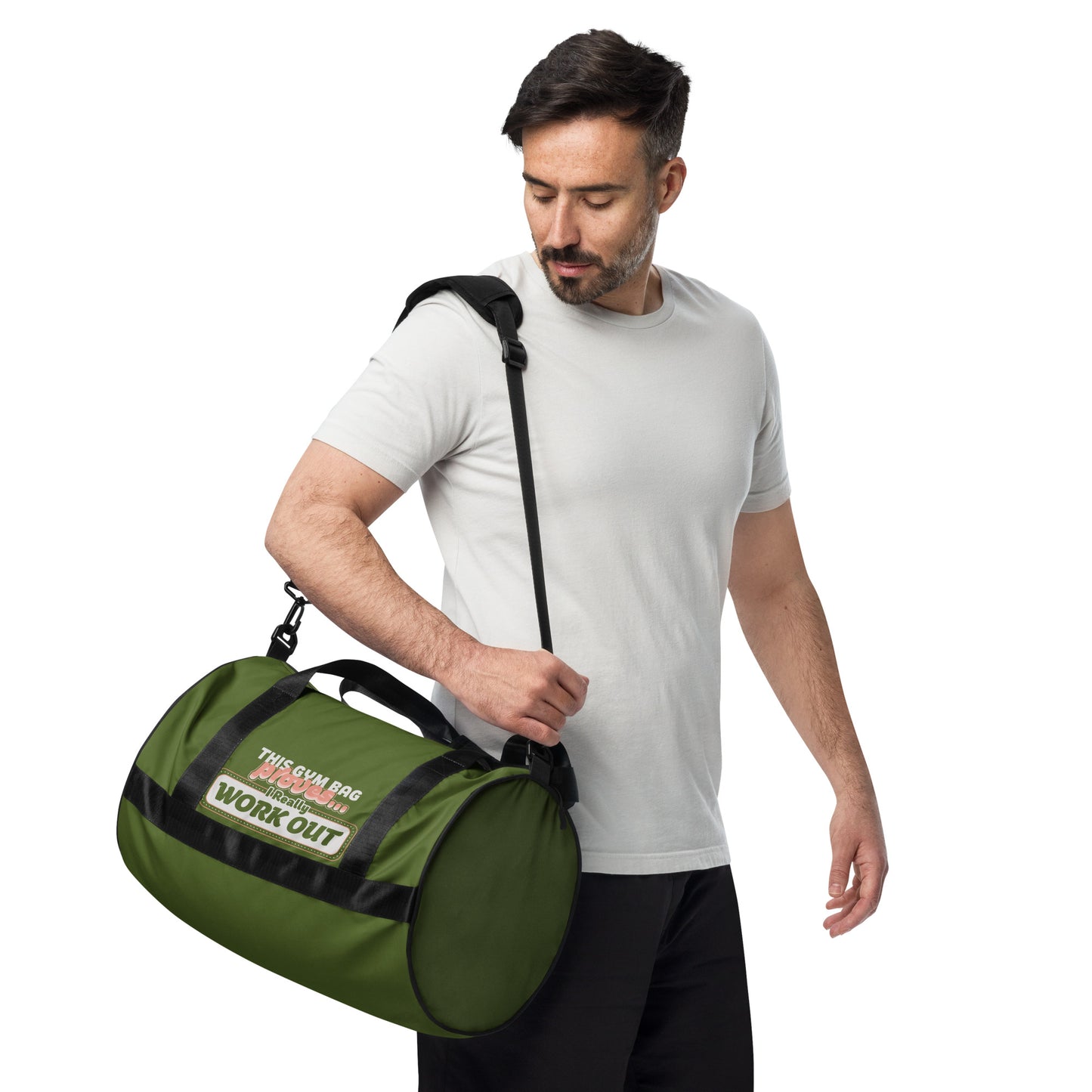 A man confidently carrying our military green gym bag, showcasing its stylish design and practical use for gym outings.