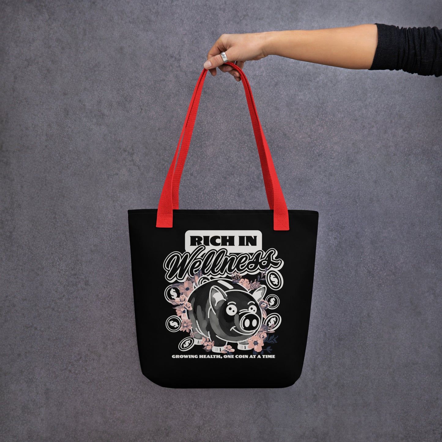 Black designer tote bag with red straps