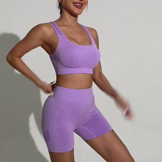 Video of purple two piece exercise set 