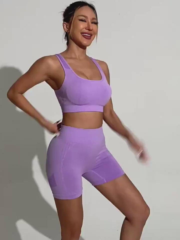 Video of purple two piece exercise set 